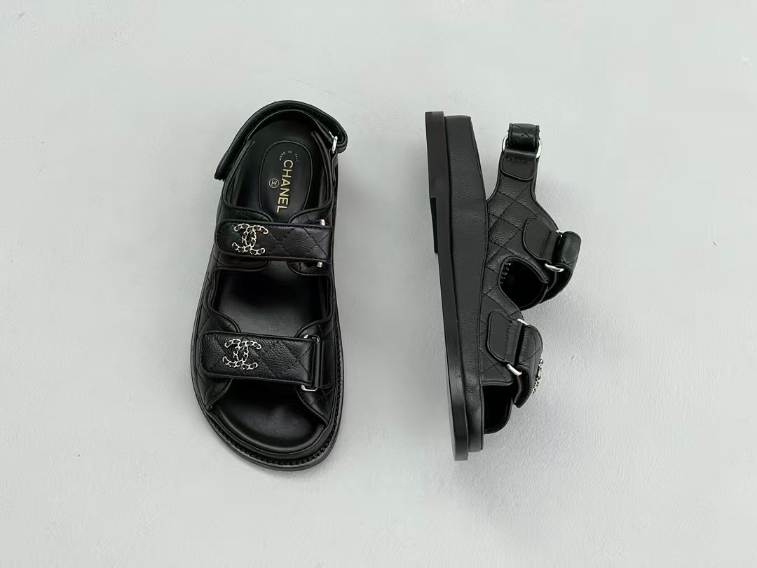 Chanel sandals feature a diamond-quilted finish and the signature interlocking CC logo on the touch-strap fastenings