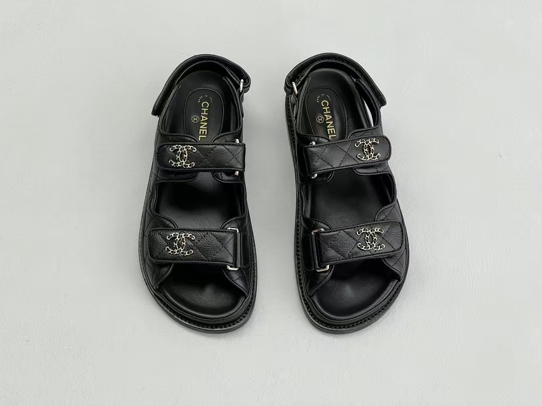 Chanel sandals feature a diamond-quilted finish and the signature interlocking CC logo on the touch-strap fastenings