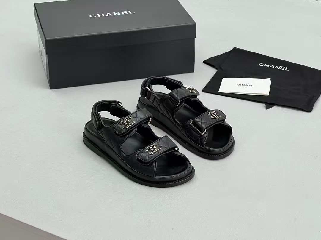 Chanel sandals feature a diamond-quilted finish and the signature interlocking CC logo on the touch-strap fastenings
