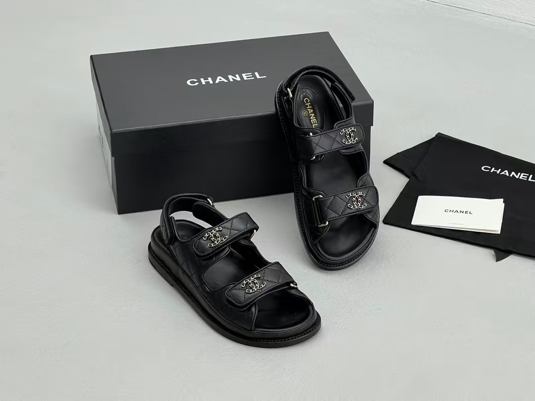 Chanel sandals feature a diamond-quilted finish and the signature interlocking CC logo on the touch-strap fastenings