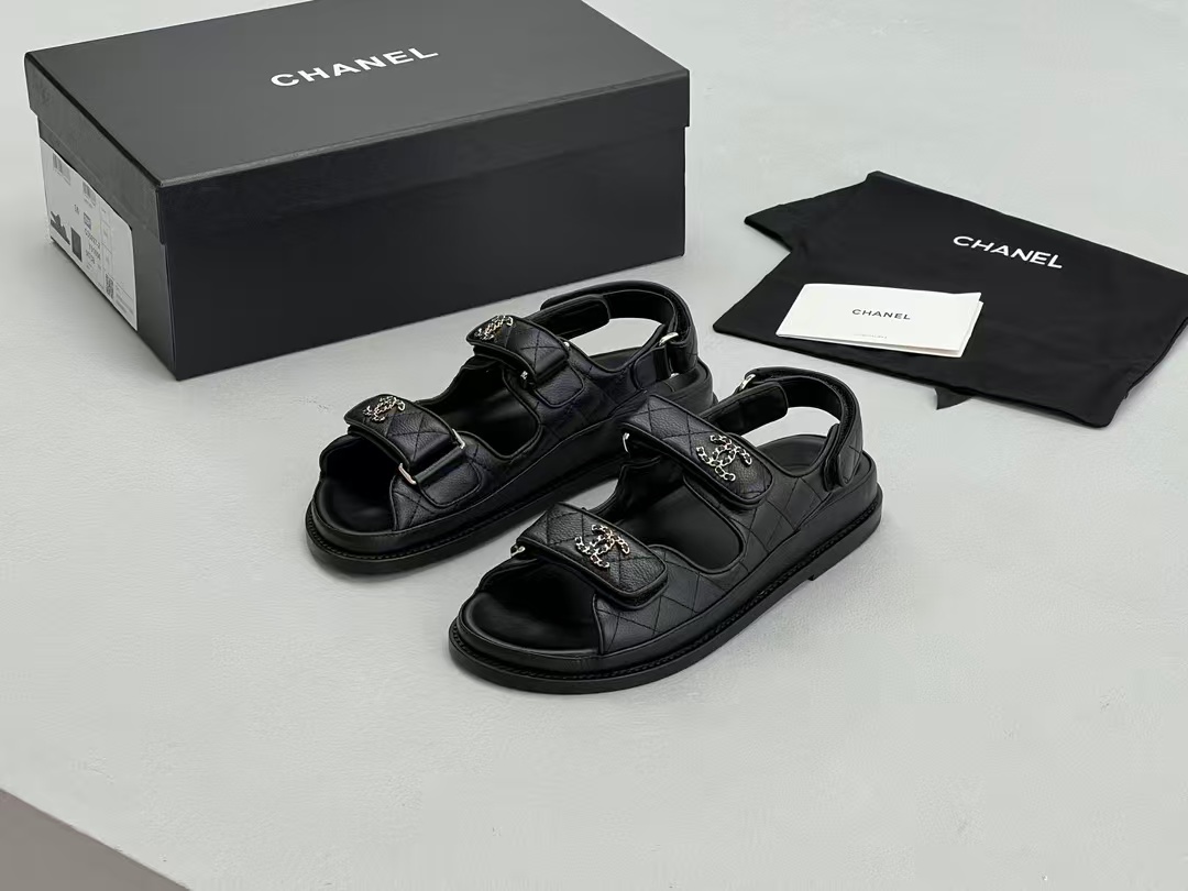 Chanel sandals feature a diamond-quilted finish and the signature interlocking CC logo on the touch-strap fastenings