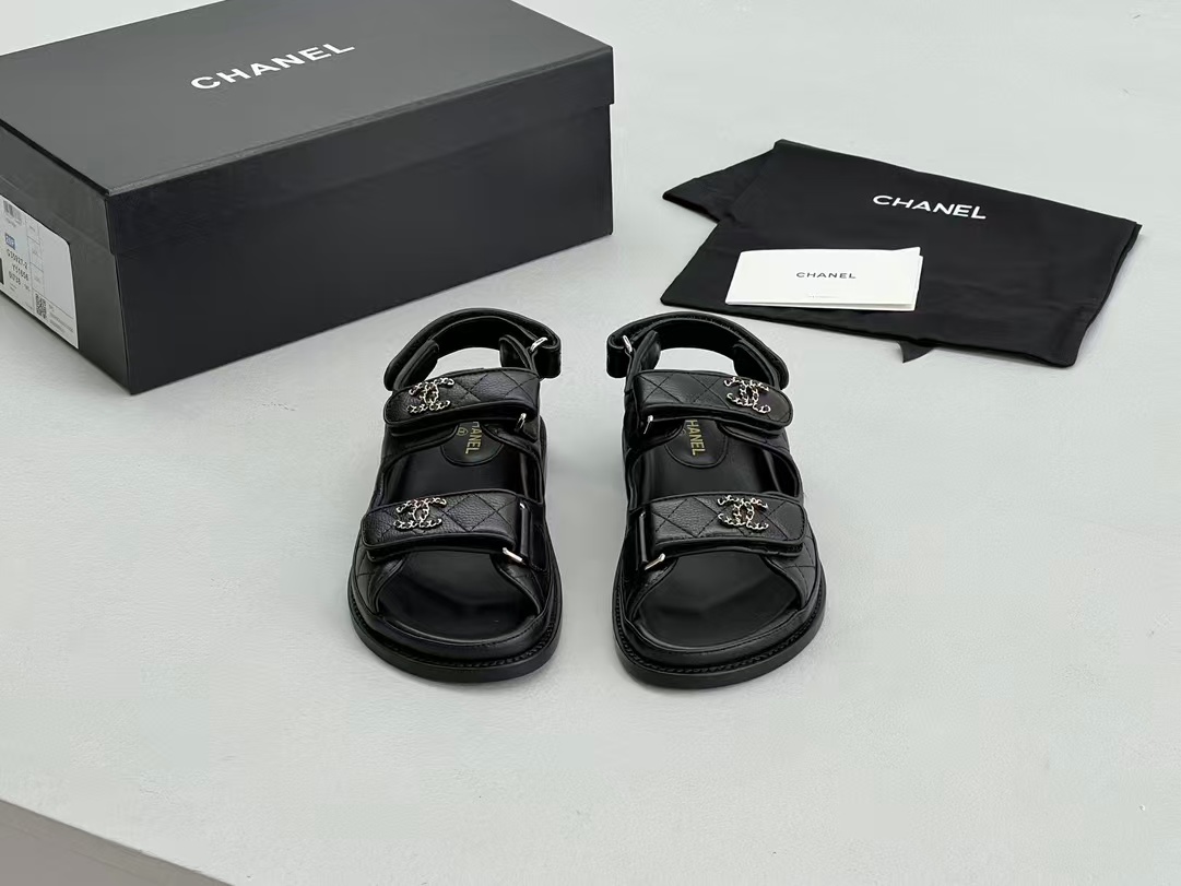 Chanel sandals feature a diamond-quilted finish and the signature interlocking CC logo on the touch-strap fastenings
