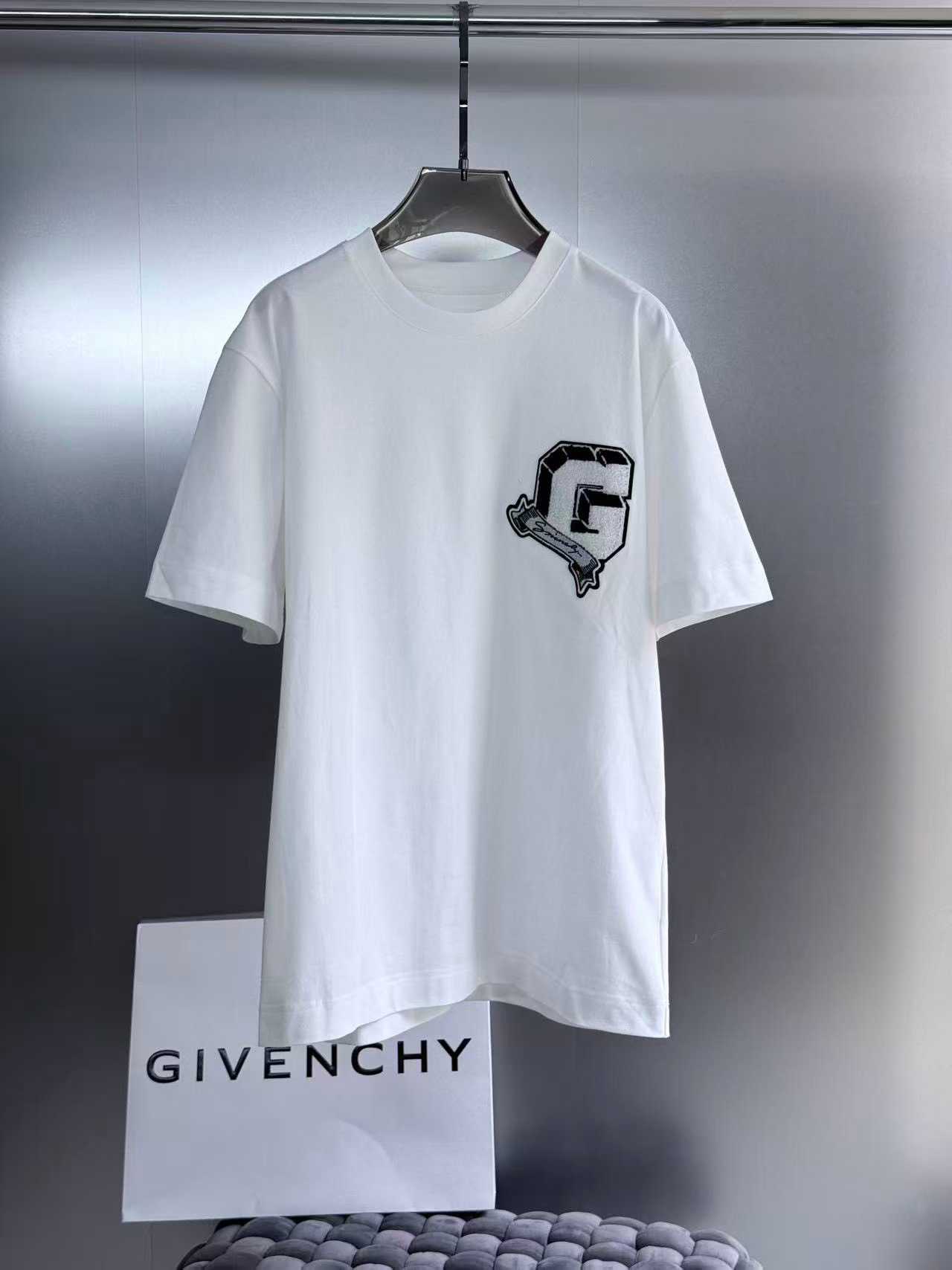 Givenchy white College Tee featuring an embroidered black and white stylized letter "G" logo patch on the chest.