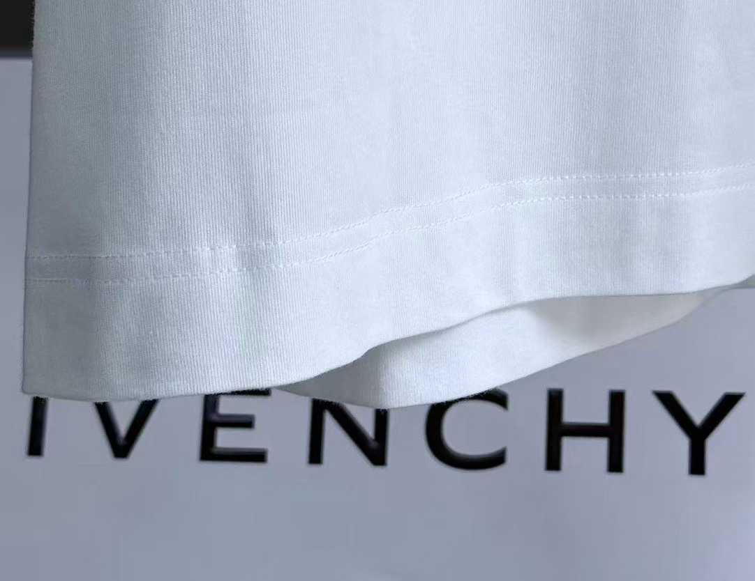 Givenchy white College Tee featuring an embroidered black and white stylized letter "G" logo patch on the chest.