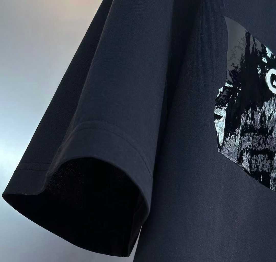 Givenchy cotton T-shirt featuring a distinctive "Givenchy Paris 1952" tape logo print on the front