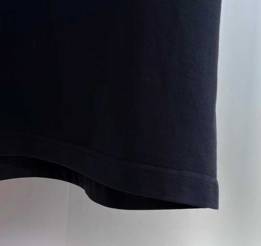 Givenchy cotton T-shirt featuring a distinctive "Givenchy Paris 1952" tape logo print on the front