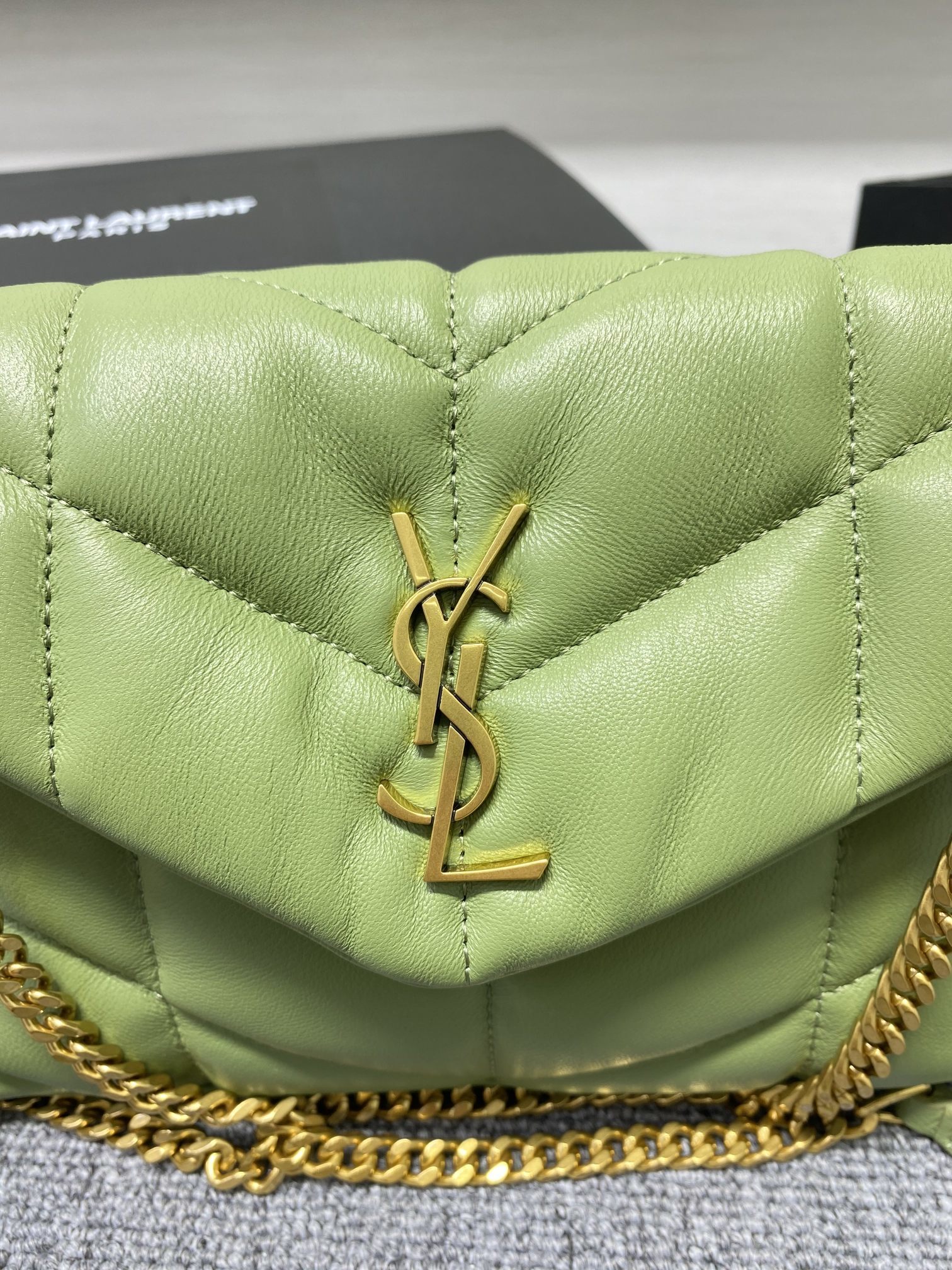 Saint Laurent Toy Puffer bag in quilted pistachio green lambskin leather with gold-tone hardware