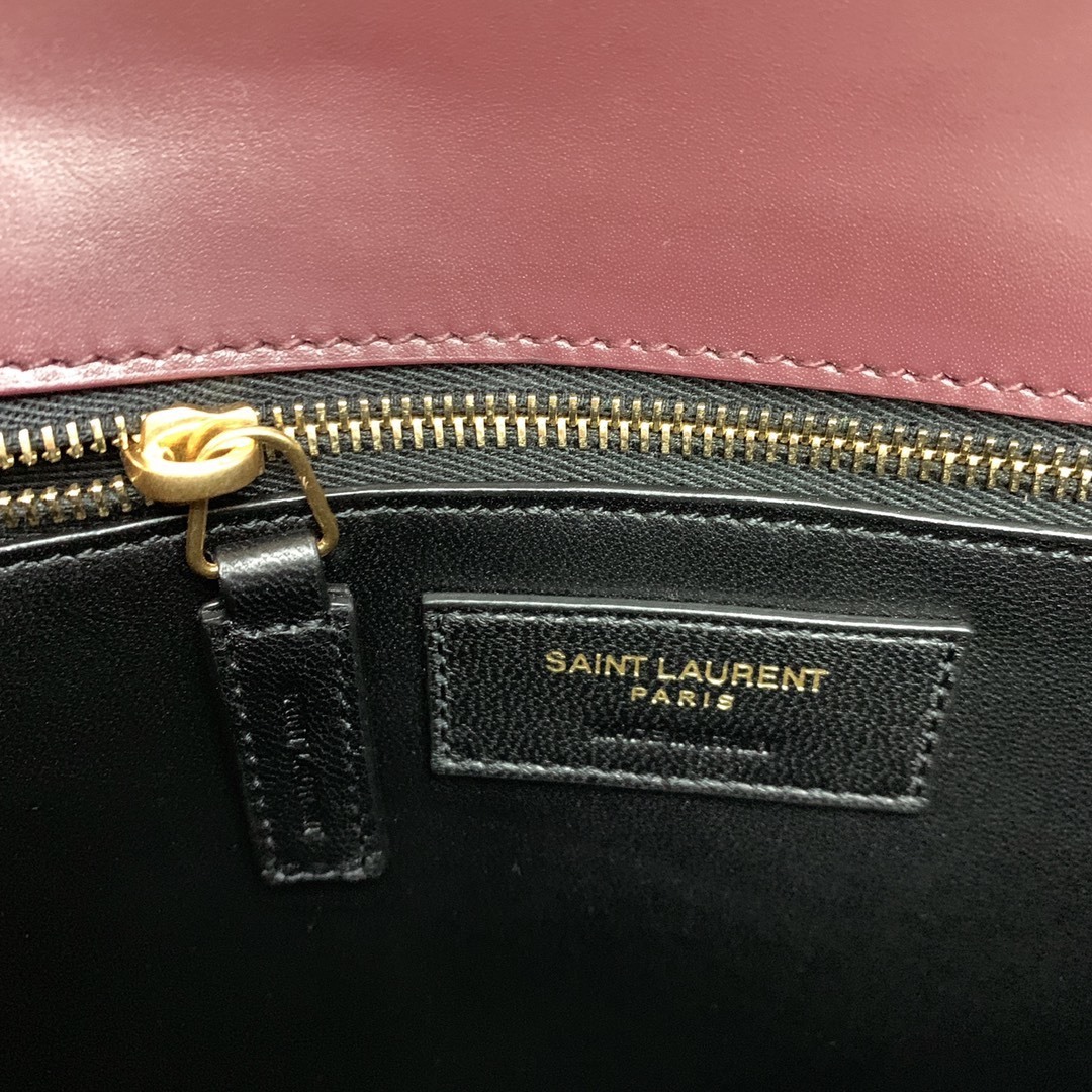 Saint Laurent Cassandra Medium Chain Bag in burgundy leather, featuring an envelope-shaped flap with a gold-tone metal YSL logo clasp