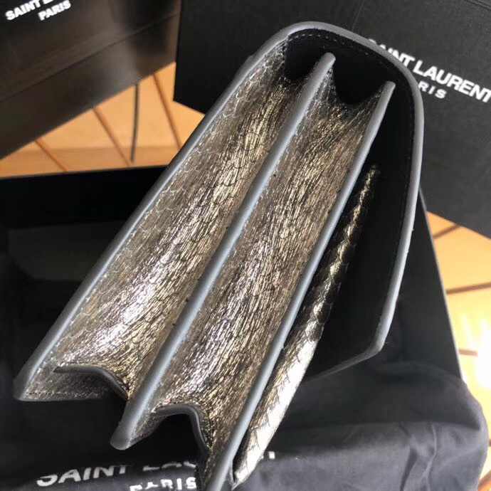 Saint Laurent Sunset Medium chain bag known for its structured accordion silhouette and iconic YSL monogram hardware