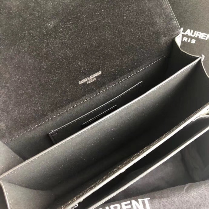 Saint Laurent Sunset Medium chain bag known for its structured accordion silhouette and iconic YSL monogram hardware