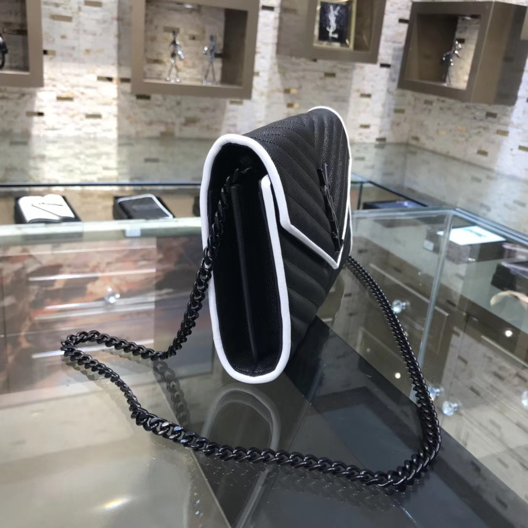 Saint Laurent Cassandre Matelassé Chain Wallet in black quilted leather with white trim