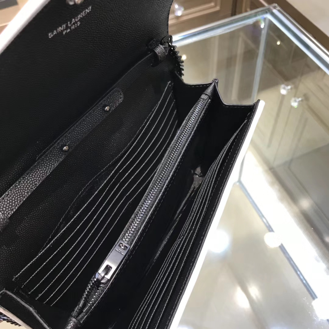 Saint Laurent Cassandre Matelassé Chain Wallet in black quilted leather with white trim