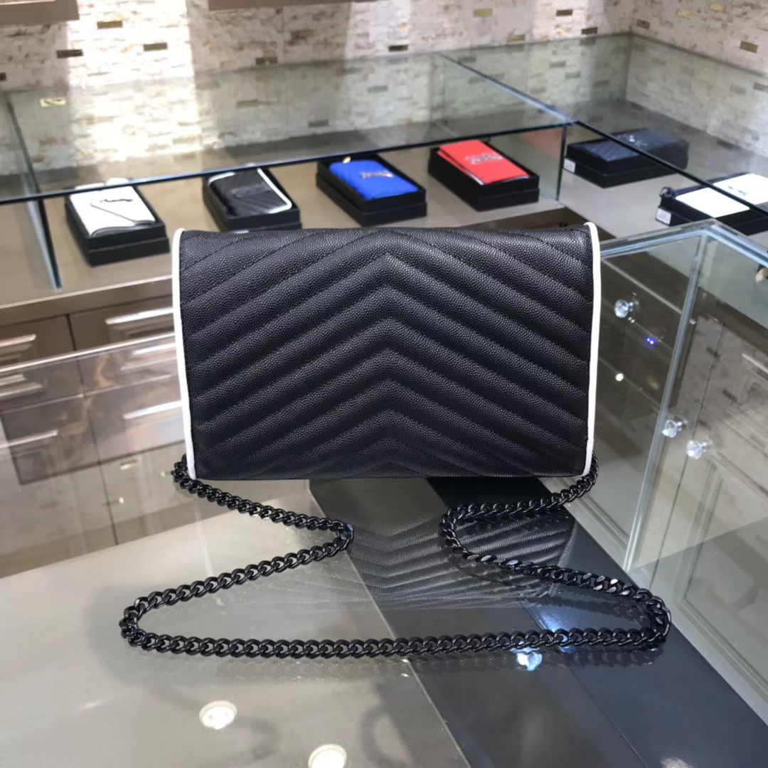 Saint Laurent Envelope Quilted Leather Chain Wallet featuring chevron stitching, tonal hardware, and white trim