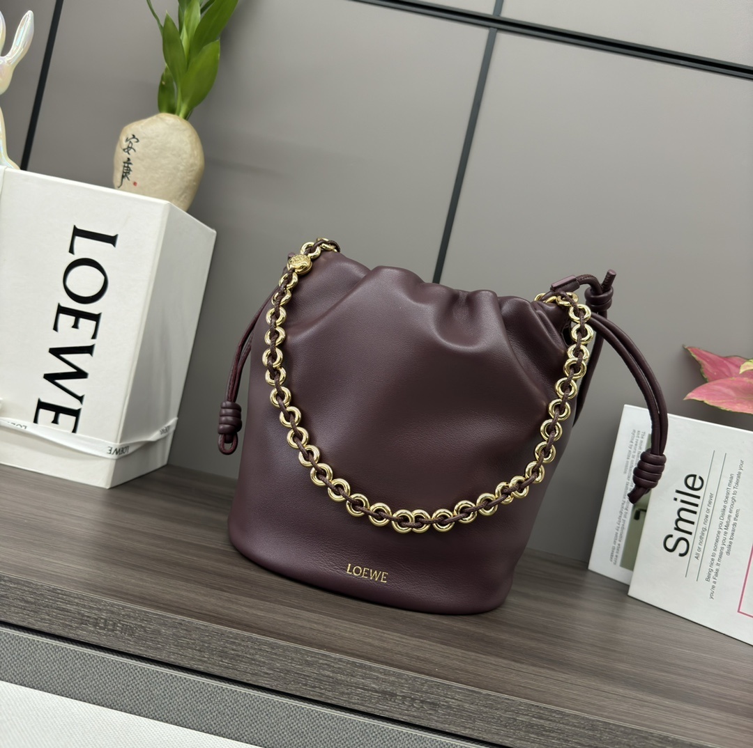 Loewe Paula's Ibiza Flamenco Bucket Bag in dark burgundy nappa leather with a gold-toned chain handle