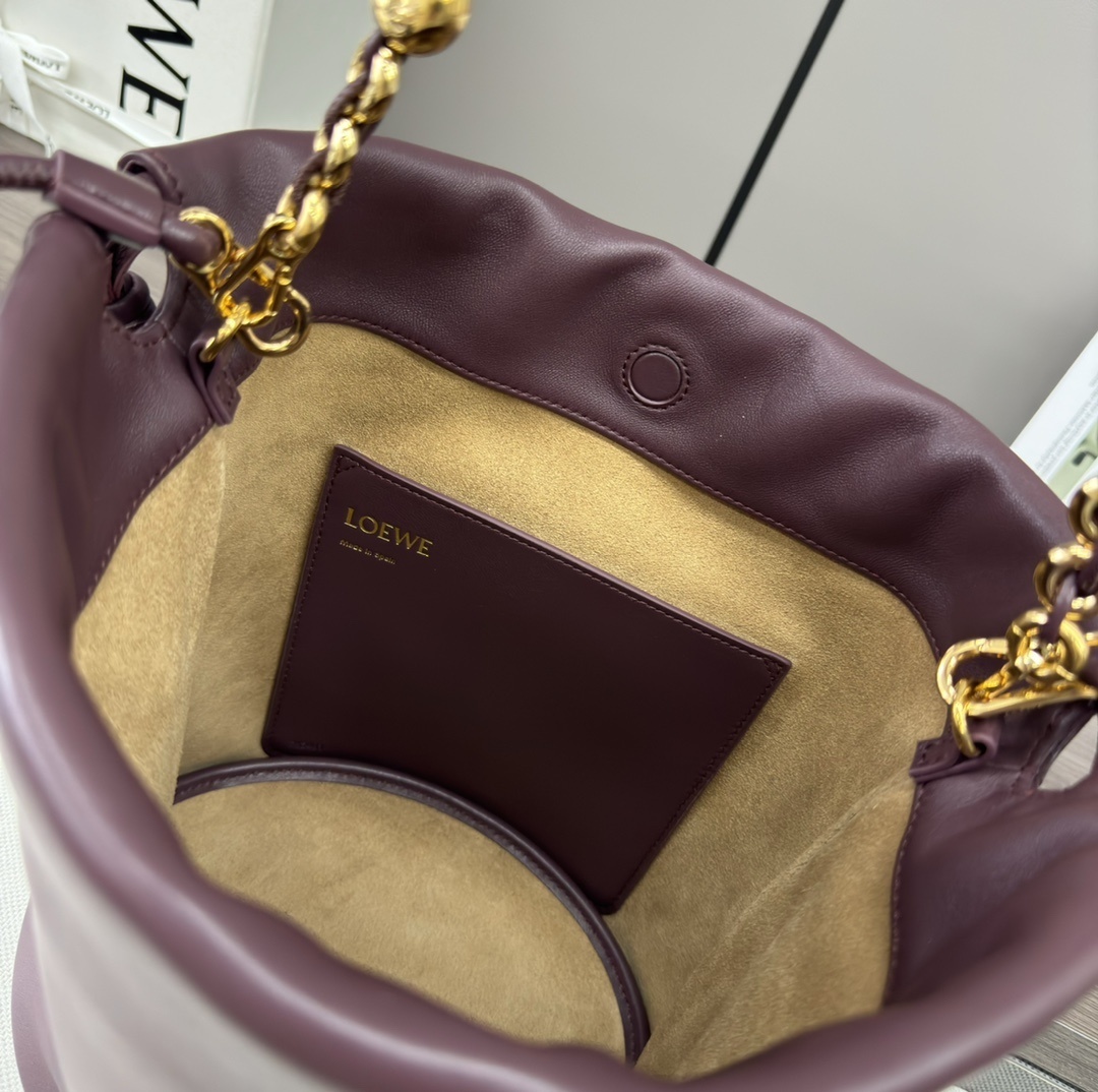 Loewe Paula's Ibiza Flamenco Bucket Bag in dark burgundy nappa leather with a gold-toned chain handle