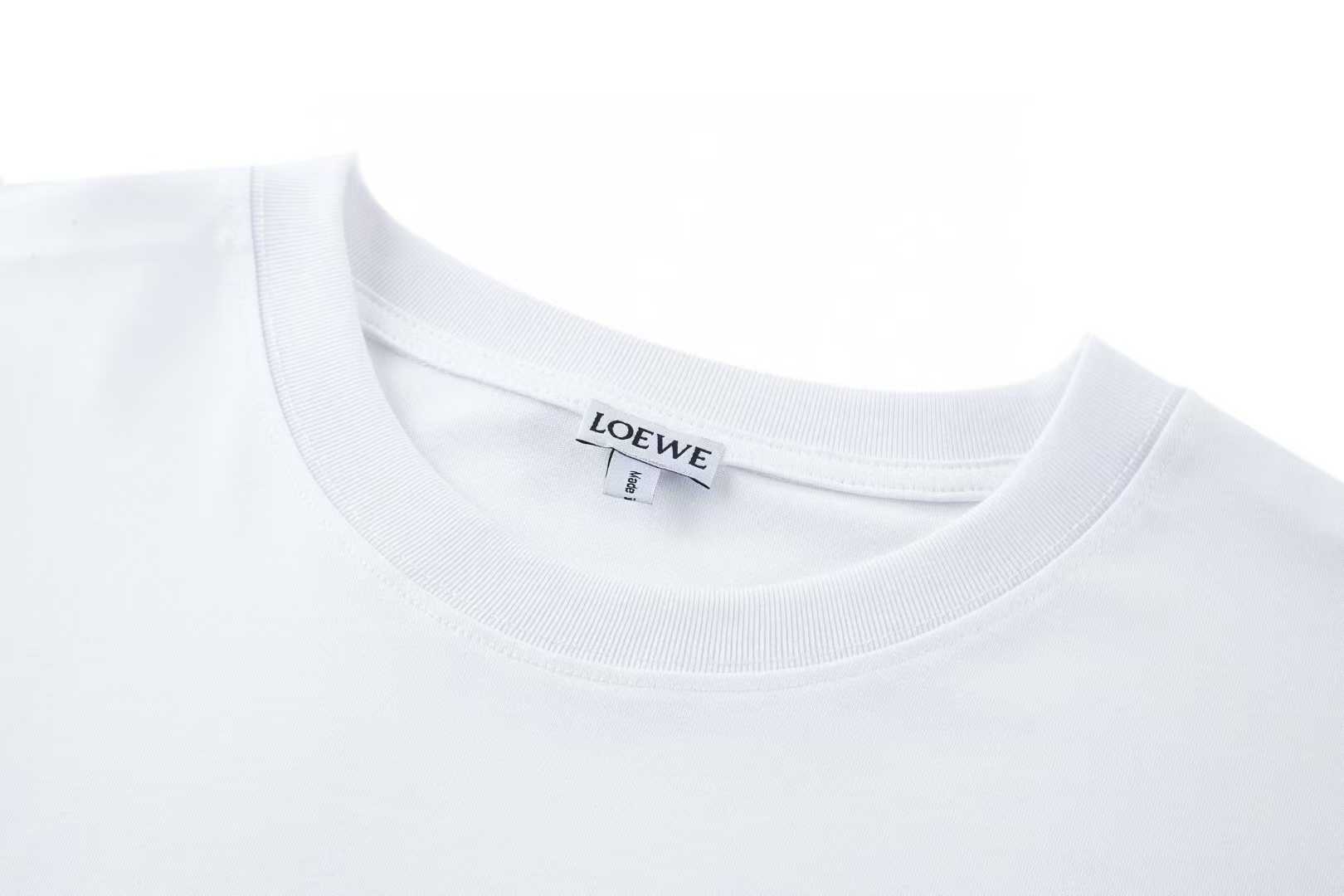 LOEWE pocket-detail T-shirt is a cotton relaxed fit garment featuring the brand's logo embroidered on the chest pocket