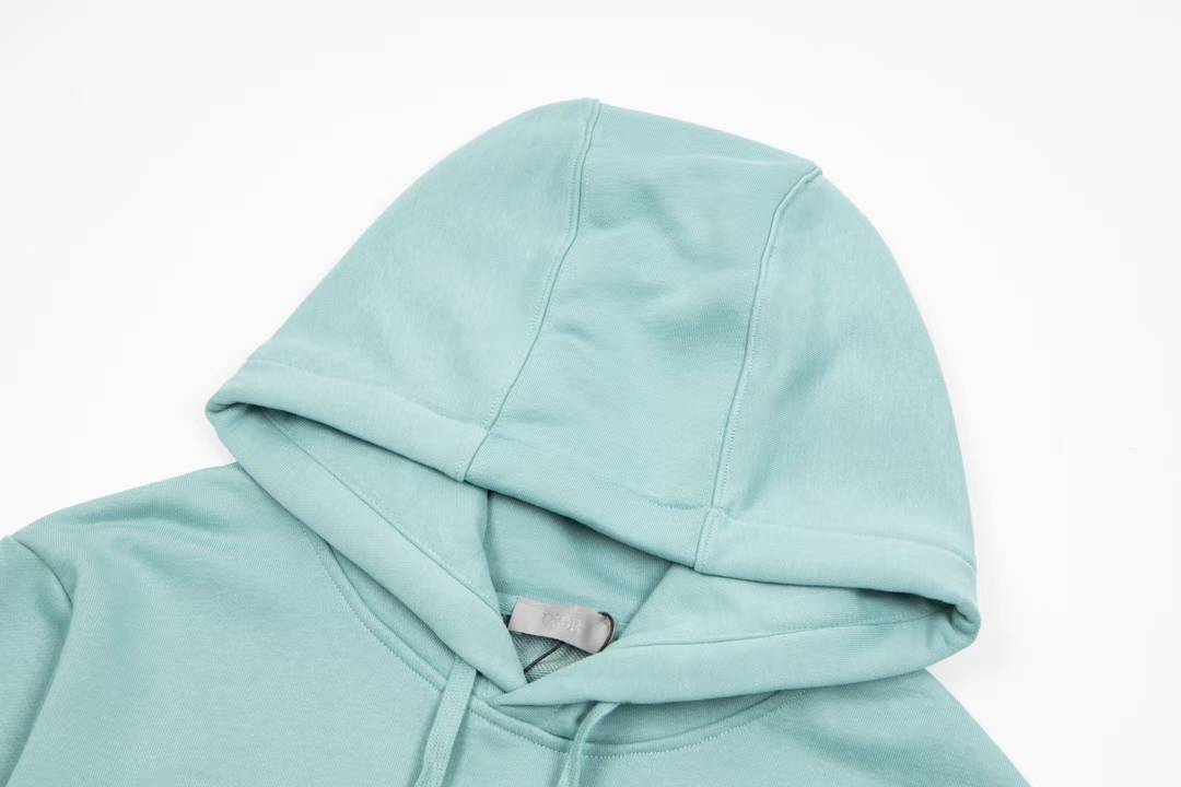 Dior aqua blue cotton fleece hooded sweatshirt featuring a revisited Christian Dior Paris signature on the front.