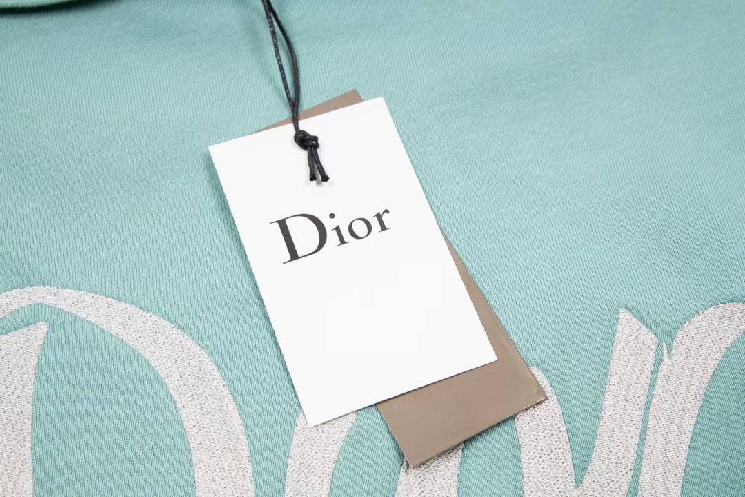 Dior aqua blue cotton fleece hooded sweatshirt featuring a revisited Christian Dior Paris signature on the front.