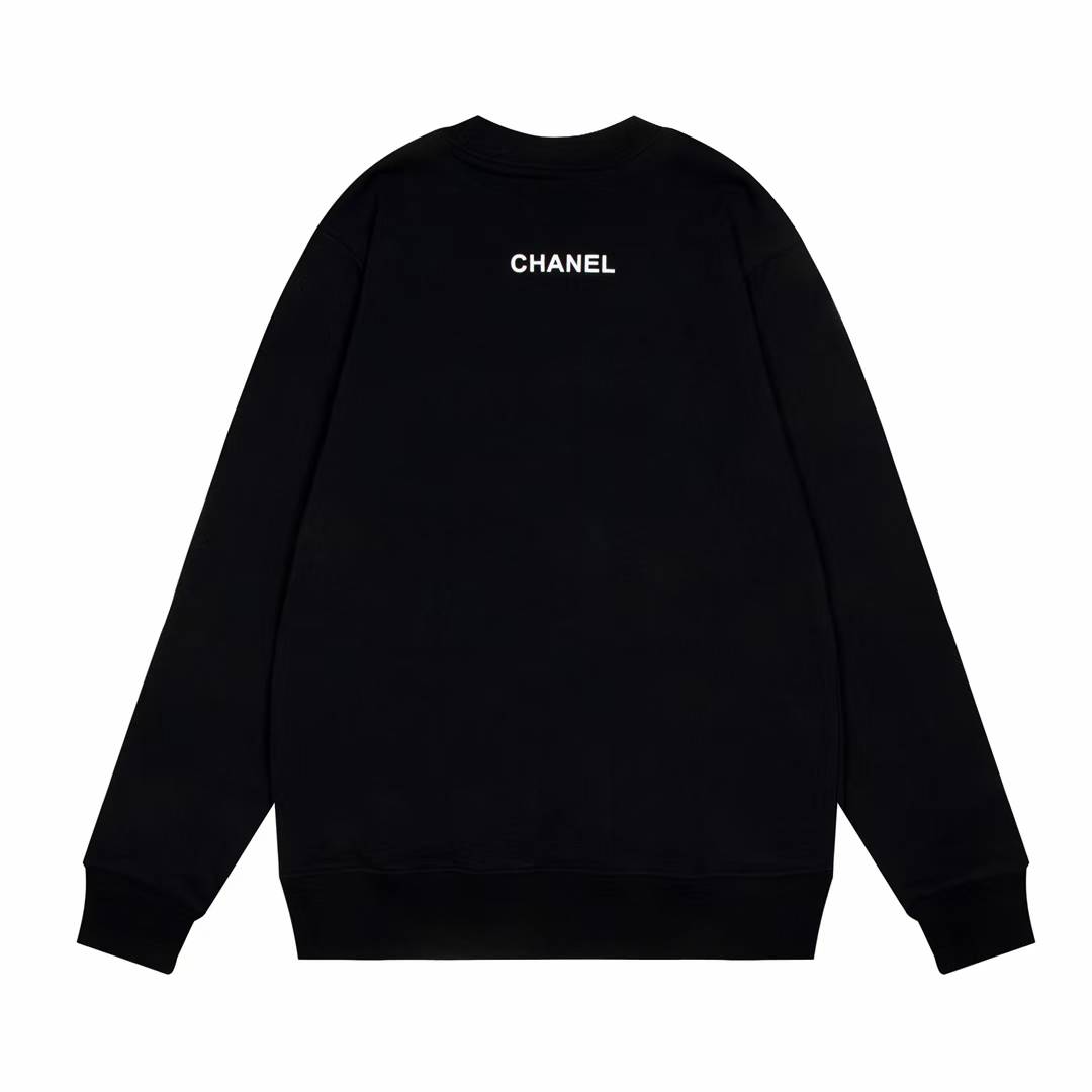 Chanel sweatshirt featuring a prominent white circular logo