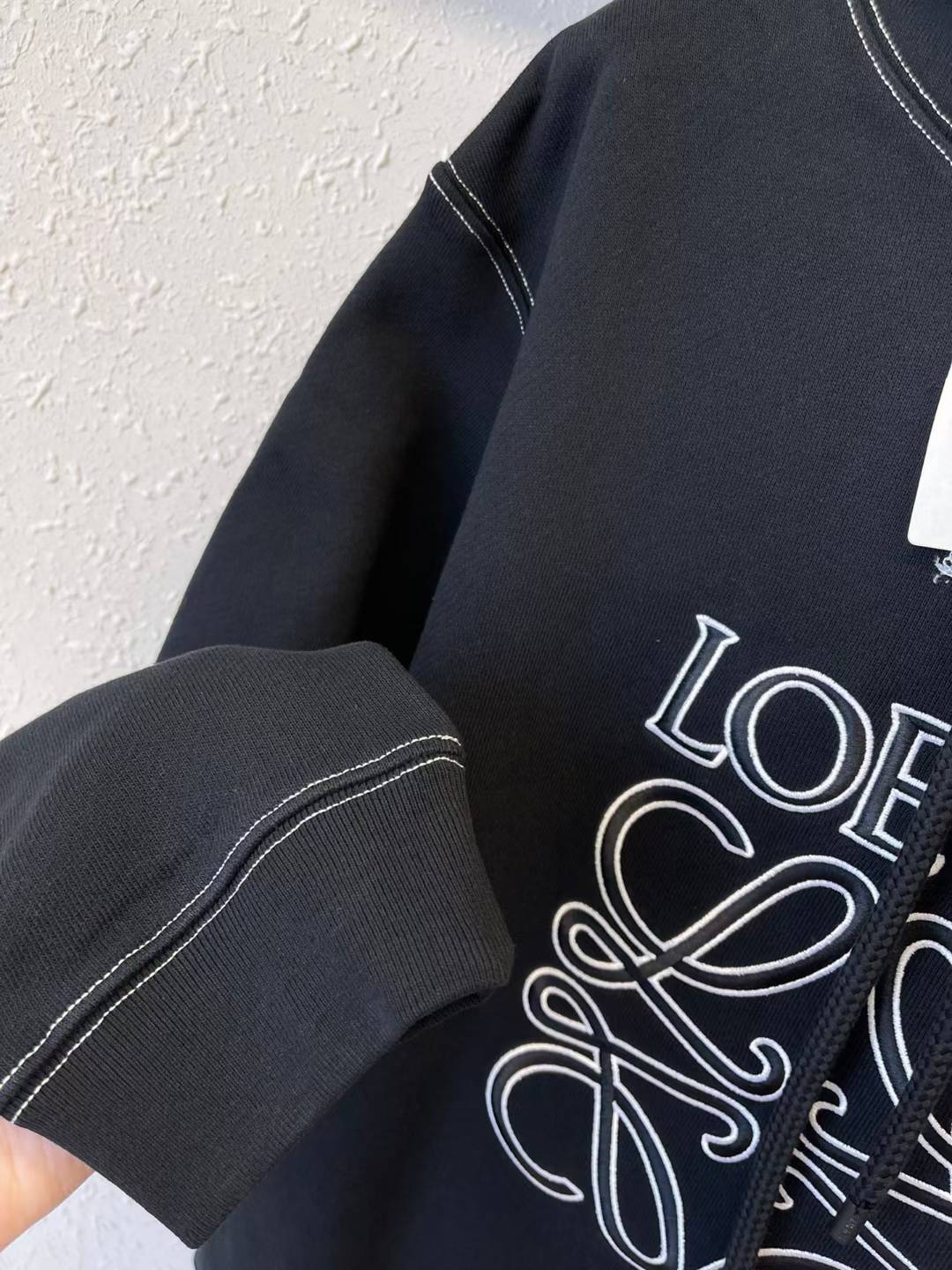 Loewe Anagram embroidered hoodie in black
