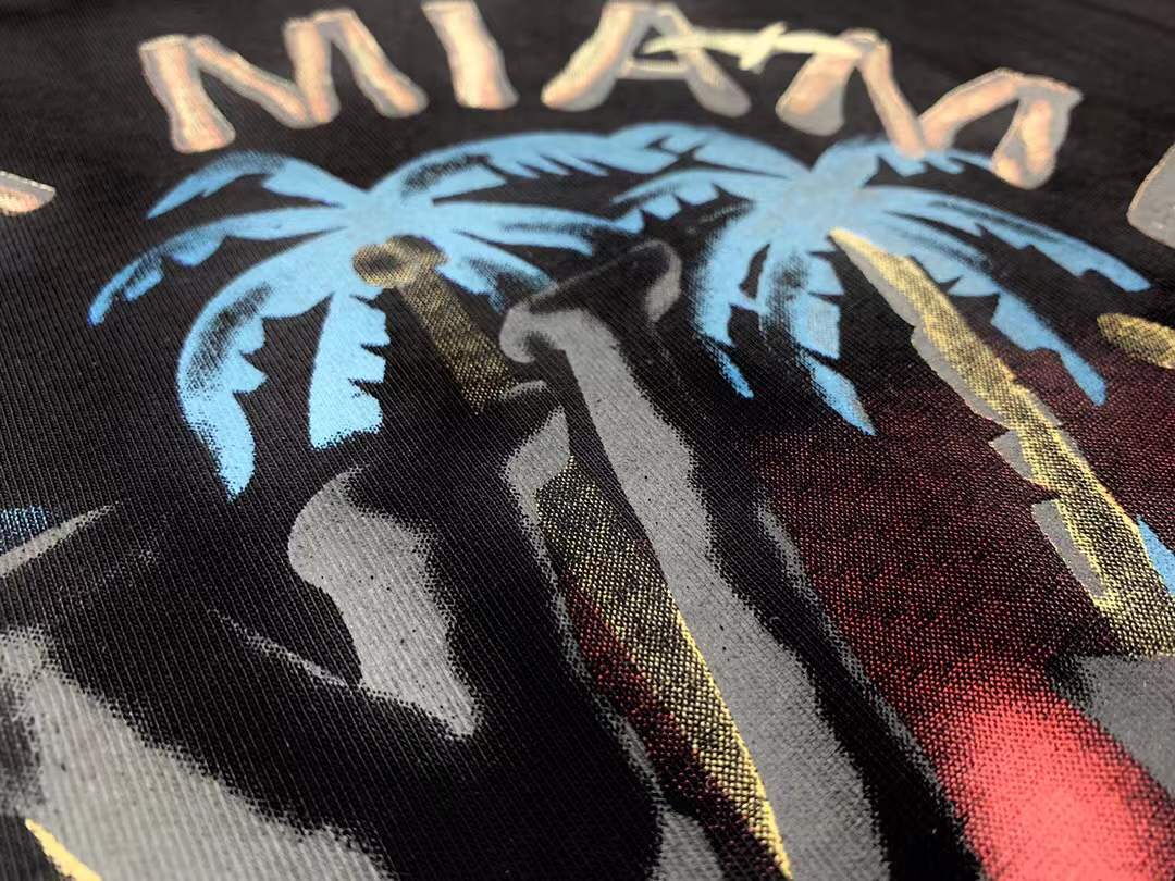 LV black crew neck T-shirt appears to be from the AMIRI X MAISON MIHARA YASUHIRO collaboration, showcasing a unique graphic design on the chest