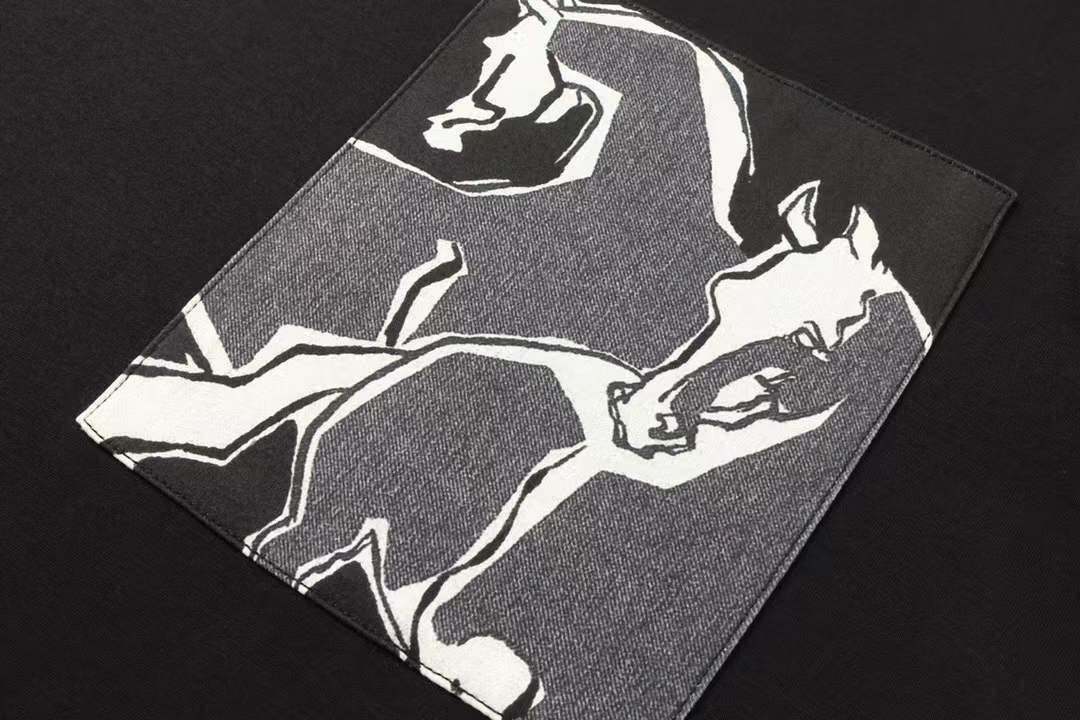 Hermès crew neck t-shirt featuring a unique graphic print of horses in a pocket-like design on the front