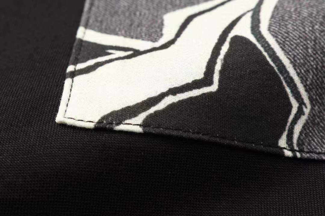 Hermès crew neck t-shirt featuring a unique graphic print of horses in a pocket-like design on the front