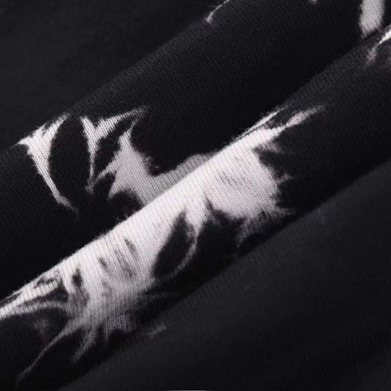 balenciaga black and white tie-dye shorts feature a Balenciaga brand logo