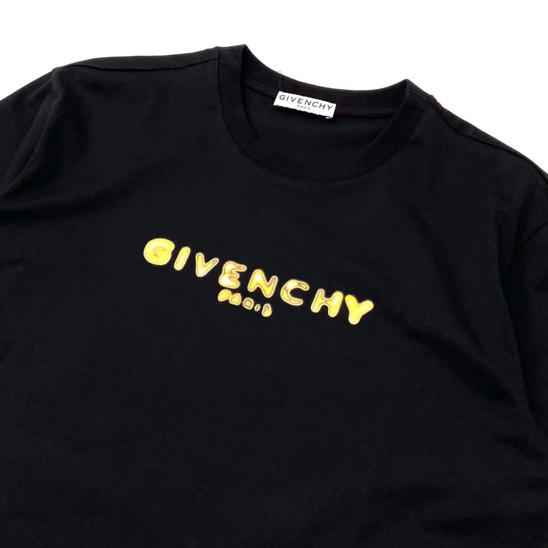 Givenchy black cotton T-shirt featuring a distinctive distressed gold logo print on the chest
