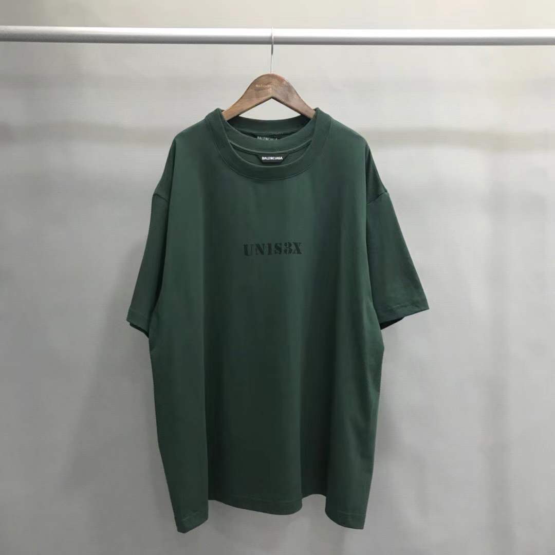 Balenciaga Unisex-Print Large Fit T-shirt in Green features "UNIS3X" text on the front