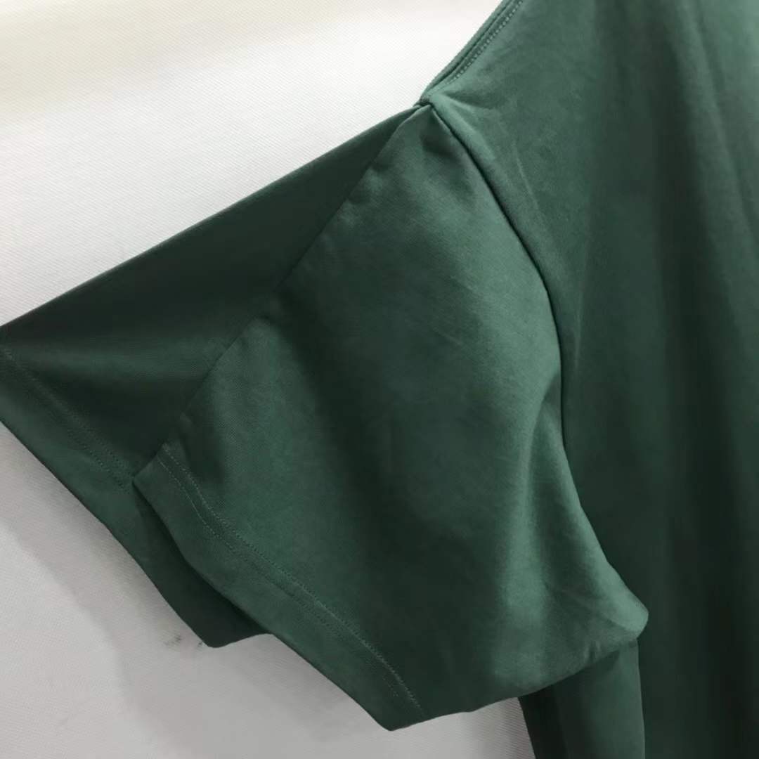 Balenciaga Unisex-Print Large Fit T-shirt in Green features "UNIS3X" text on the front