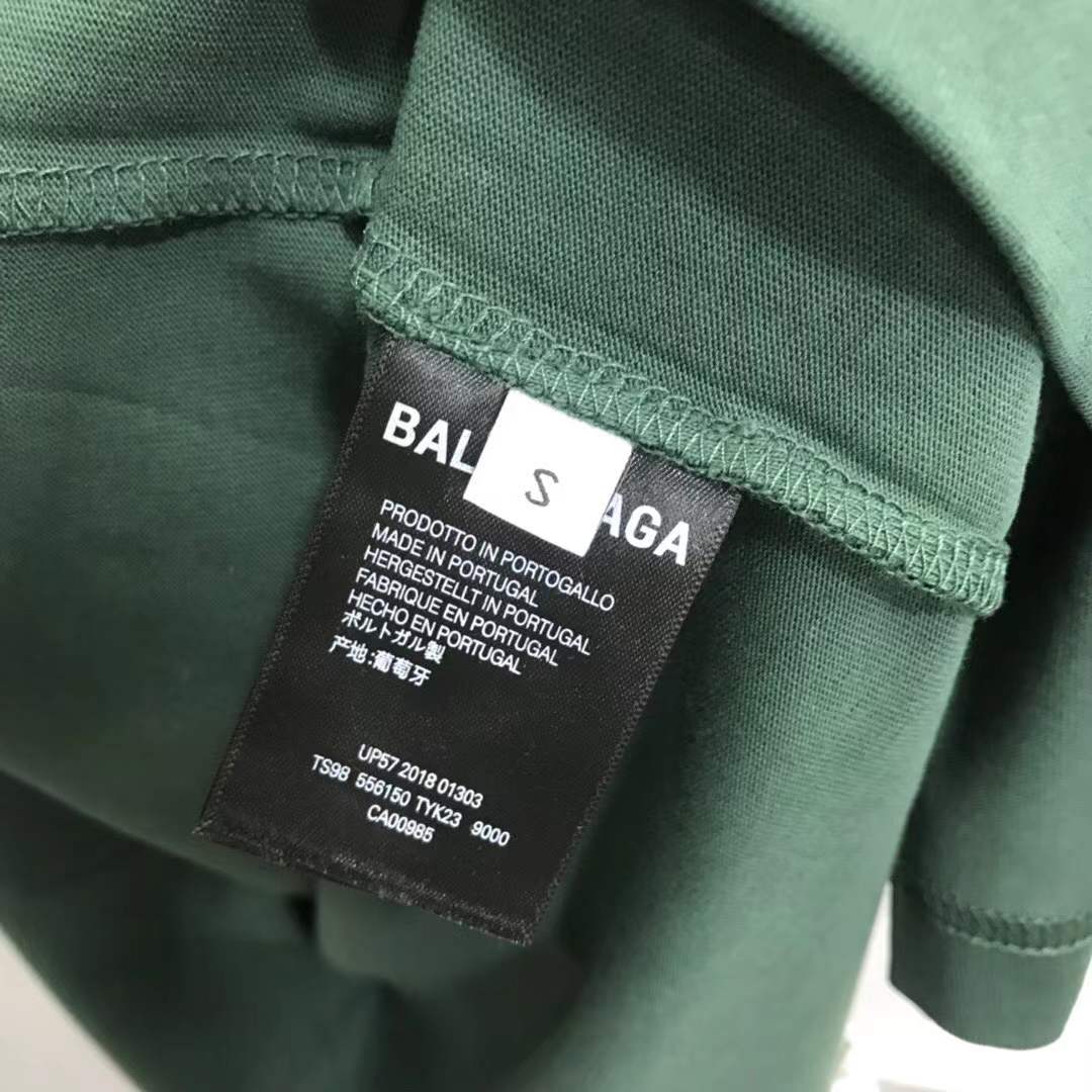 Balenciaga Unisex-Print Large Fit T-shirt in Green features "UNIS3X" text on the front