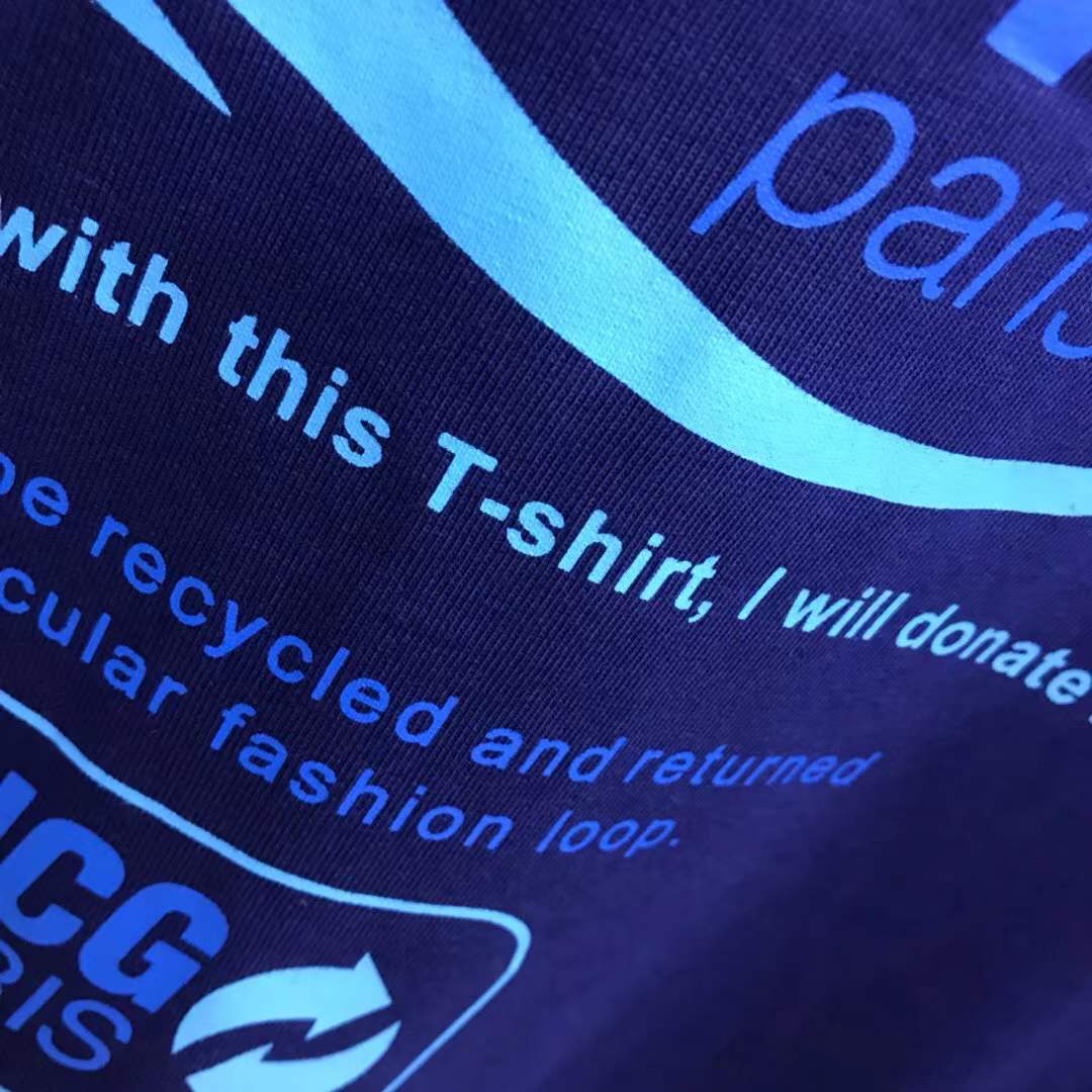 Balenciaga Dry Cleaning Boxy T-Shirt in blue cotton features a short-sleeved, crewneck design with a printed motif on the front