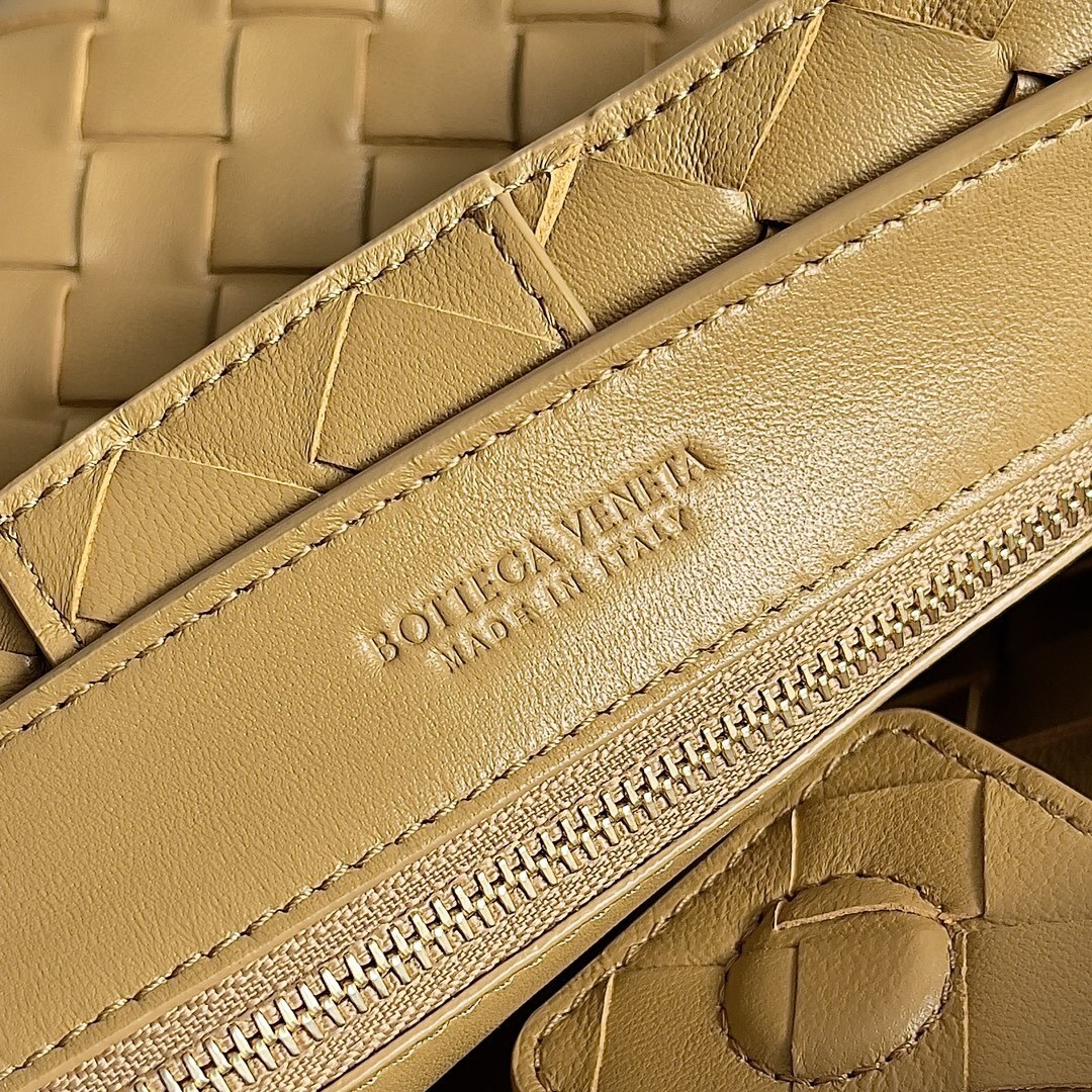 Bottega Veneta Small Andiamo top handle bag in a woven leather design