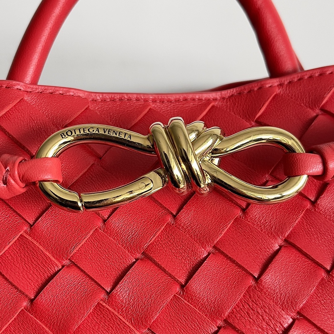Bottega Veneta Andiamo top handle bag in a woven red leather design