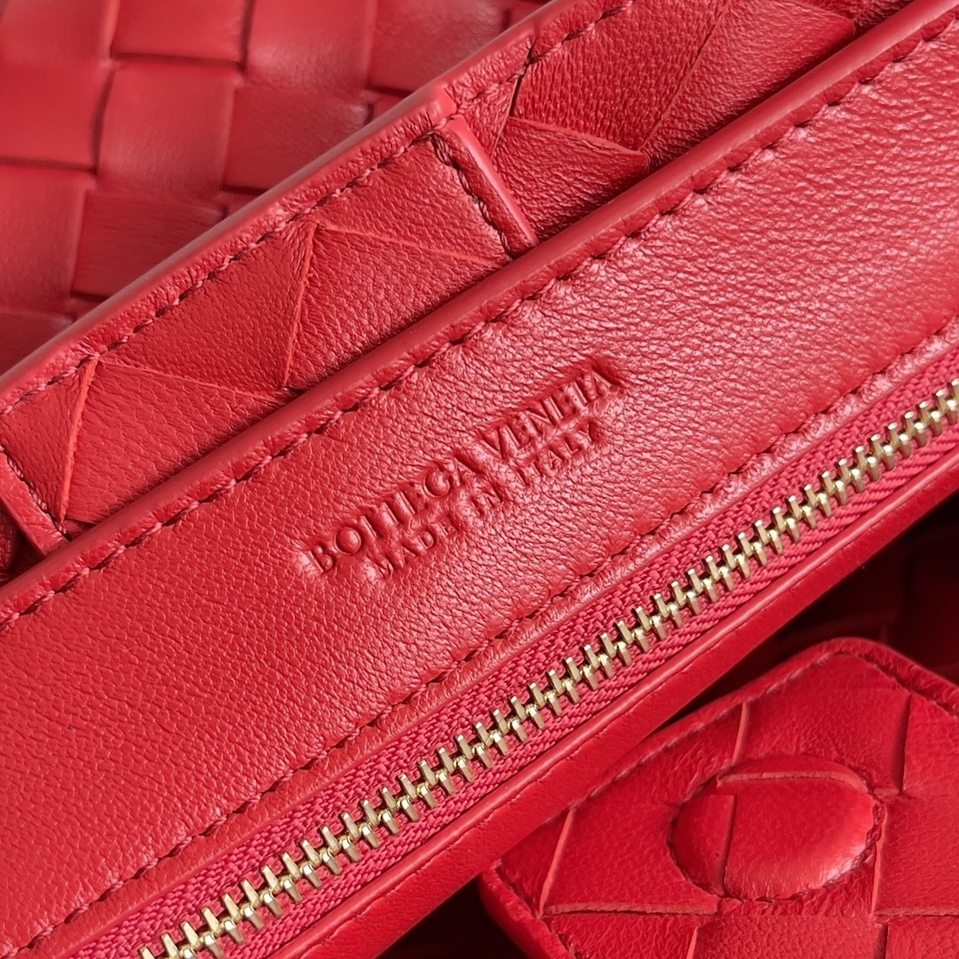 Bottega Veneta Andiamo top handle bag in a woven red leather design