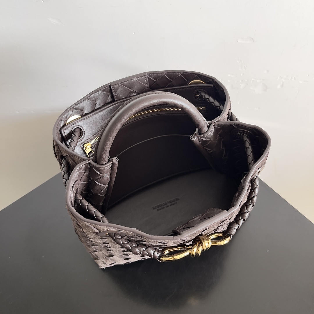 Bottega Veneta Small Andiamo Top Handle Bag featuring the brand's signature Intrecciato woven design in suede.