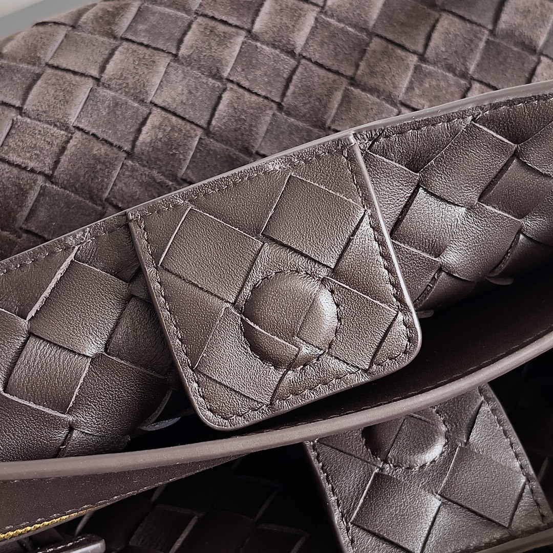 Bottega Veneta Small Andiamo Top Handle Bag featuring the brand's signature Intrecciato woven design in suede.