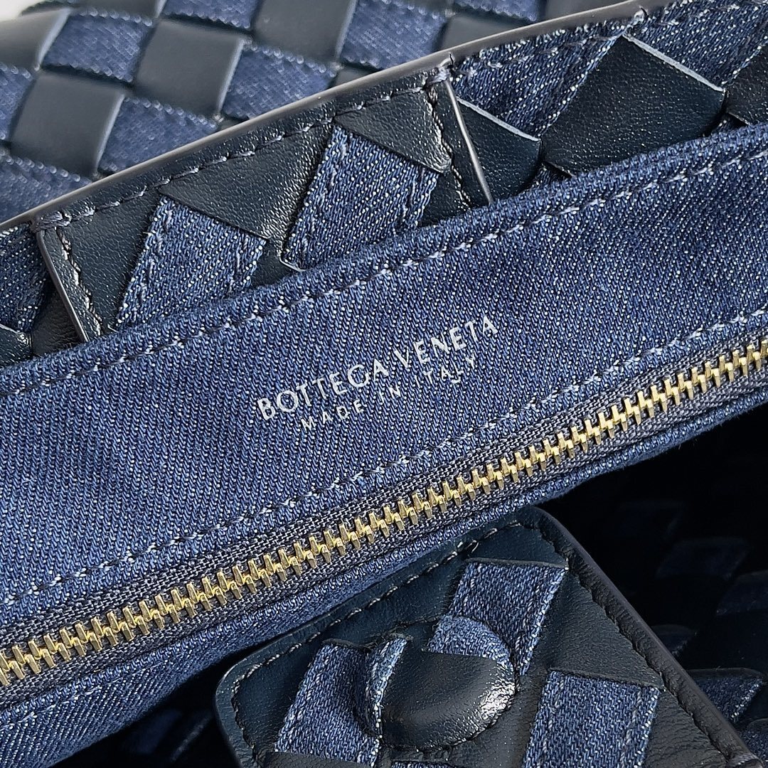 Bottega Veneta Small Andiamo top handle bag in a blue woven design