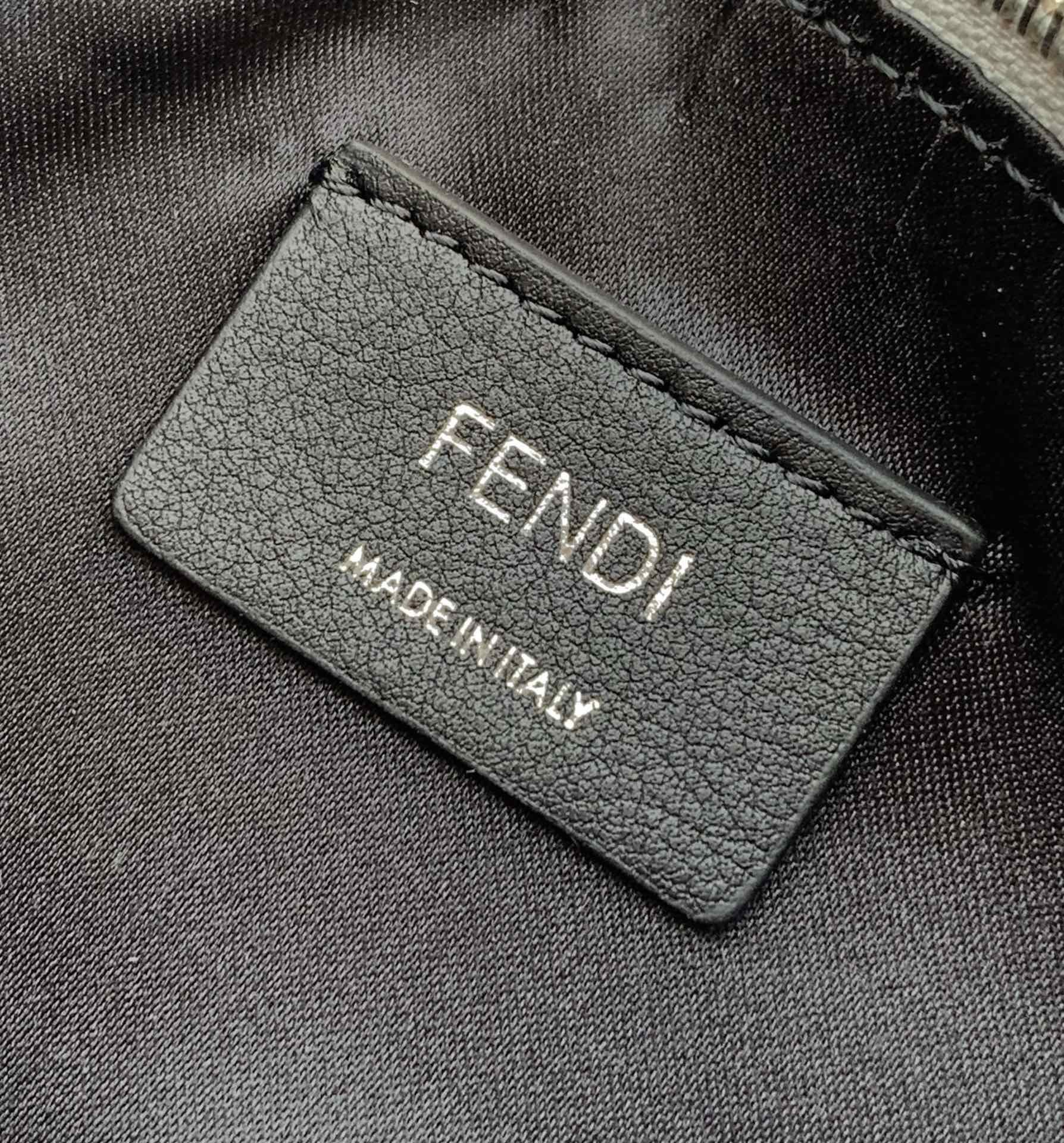 Fendi Fendigraphy Mini hobo bag featuring the brand's signature FF jacquard motif fabric and metal lettering on the bottom
