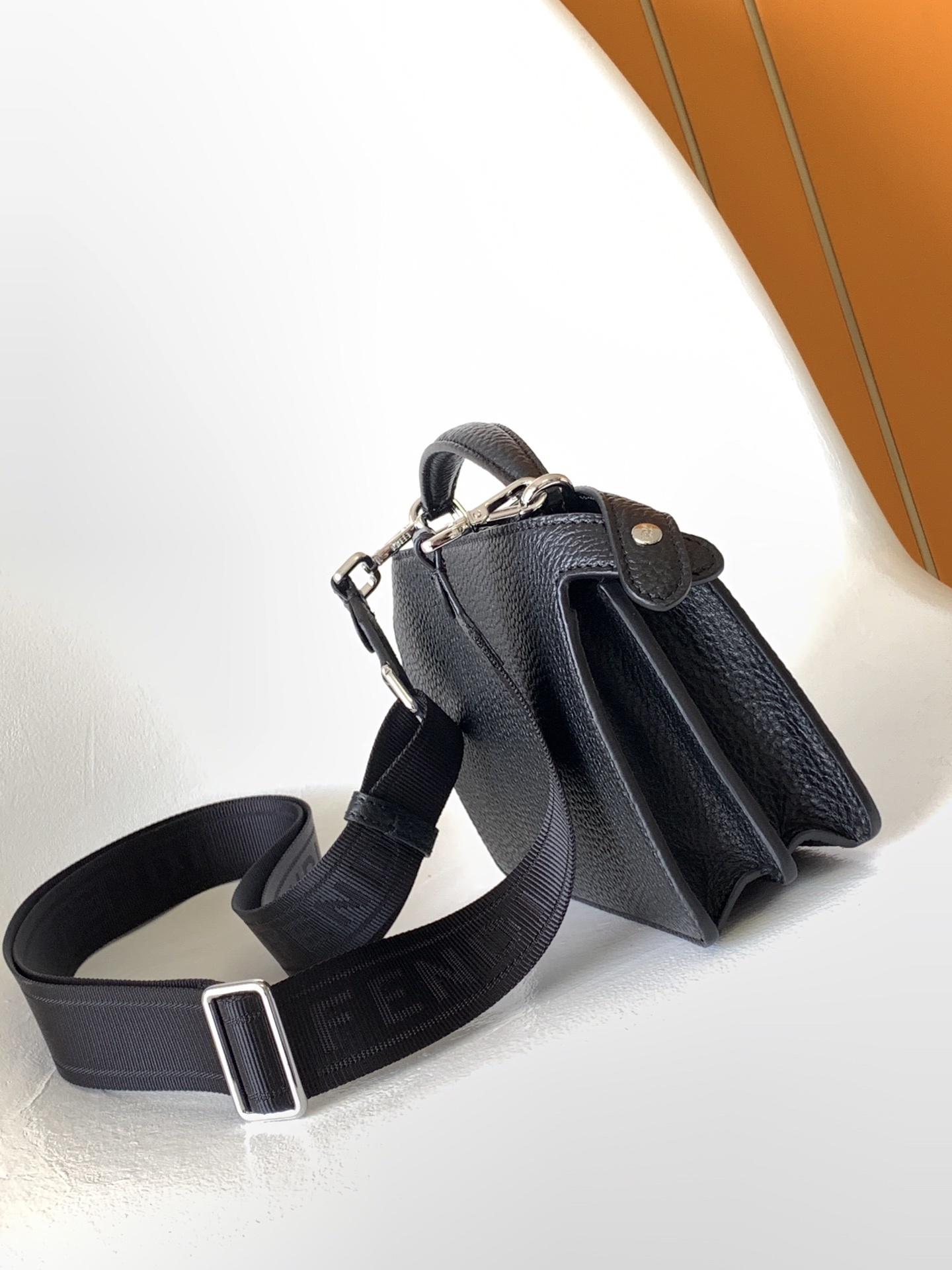 Fendi Peekaboo ISeeU handbag featuring a top handle and a detachable shoulder strap