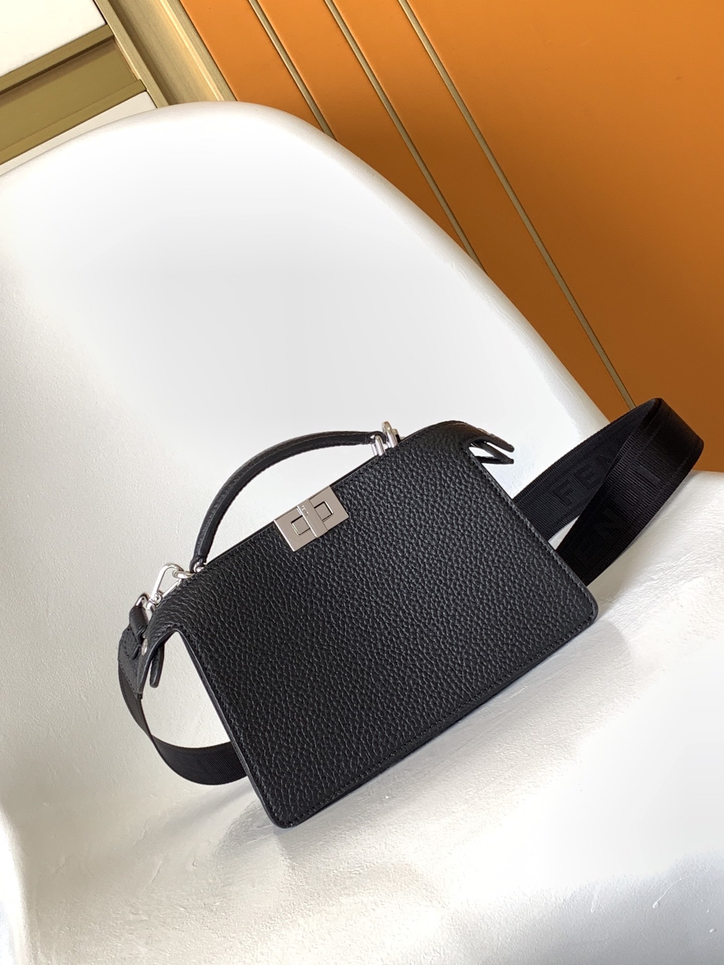 Fendi Peekaboo ISeeU handbag featuring a top handle and a detachable shoulder strap