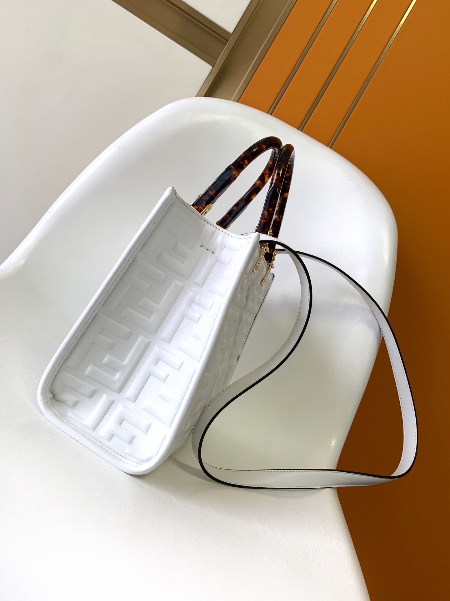 Fendi Sunshine Small Leather Shopper bag featuring the iconic FF logo embossed in 3D and distinctive tortoiseshell plexiglass handles