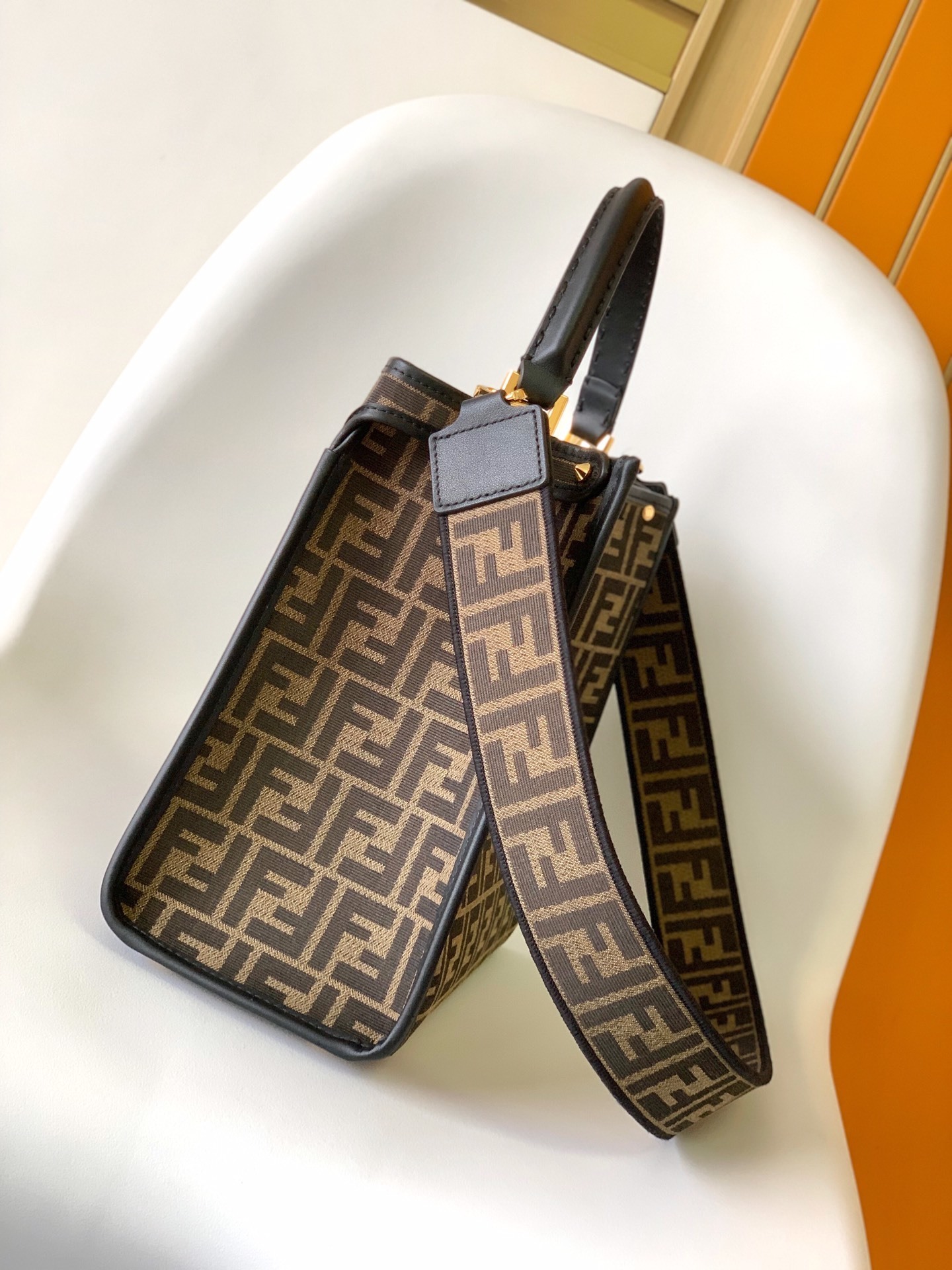Fendi Peekaboo top handle bag featuring the iconic Zucca monogram pattern