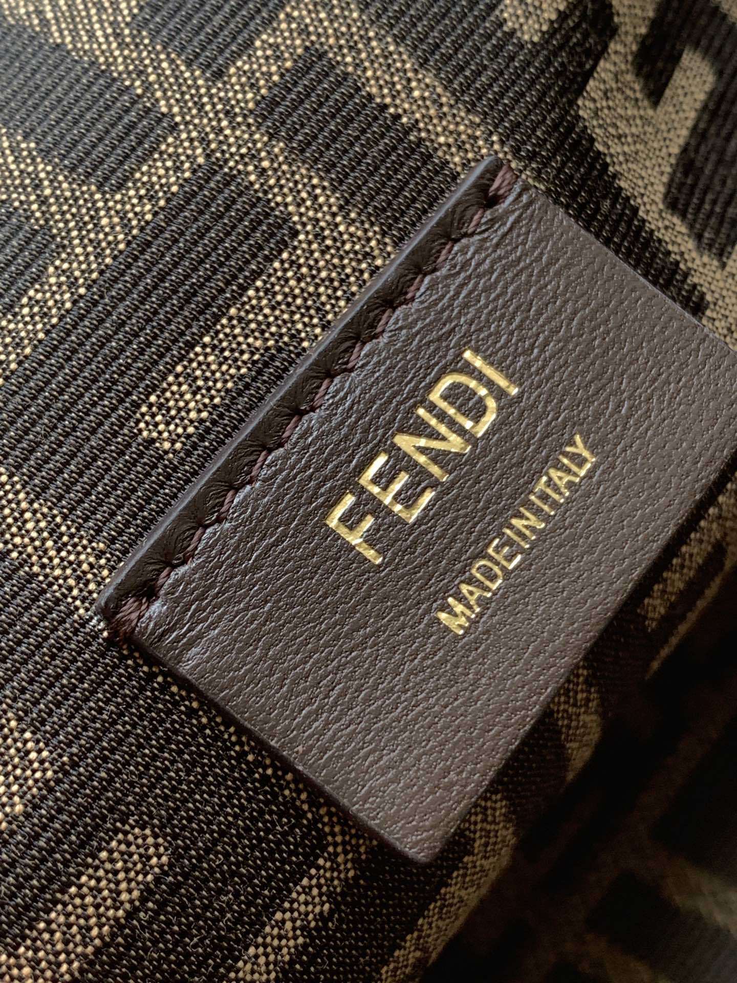 Fendi Avocado Green Leather and Python Small First Clutch, featuring an iconic oversized 'F' clasp and a detachable shoulder strap