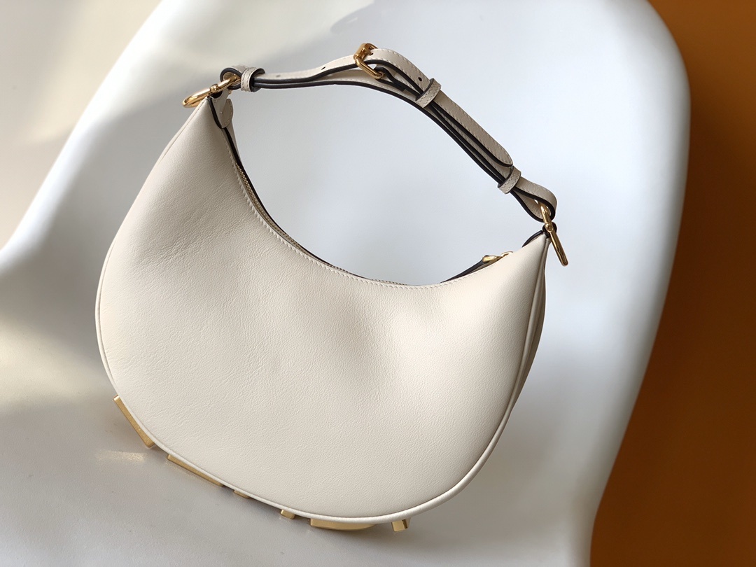 Fendi Fendigraphy leather shoulder bag often referred to as a hobo bag, featuring gold-tone metal hardware.