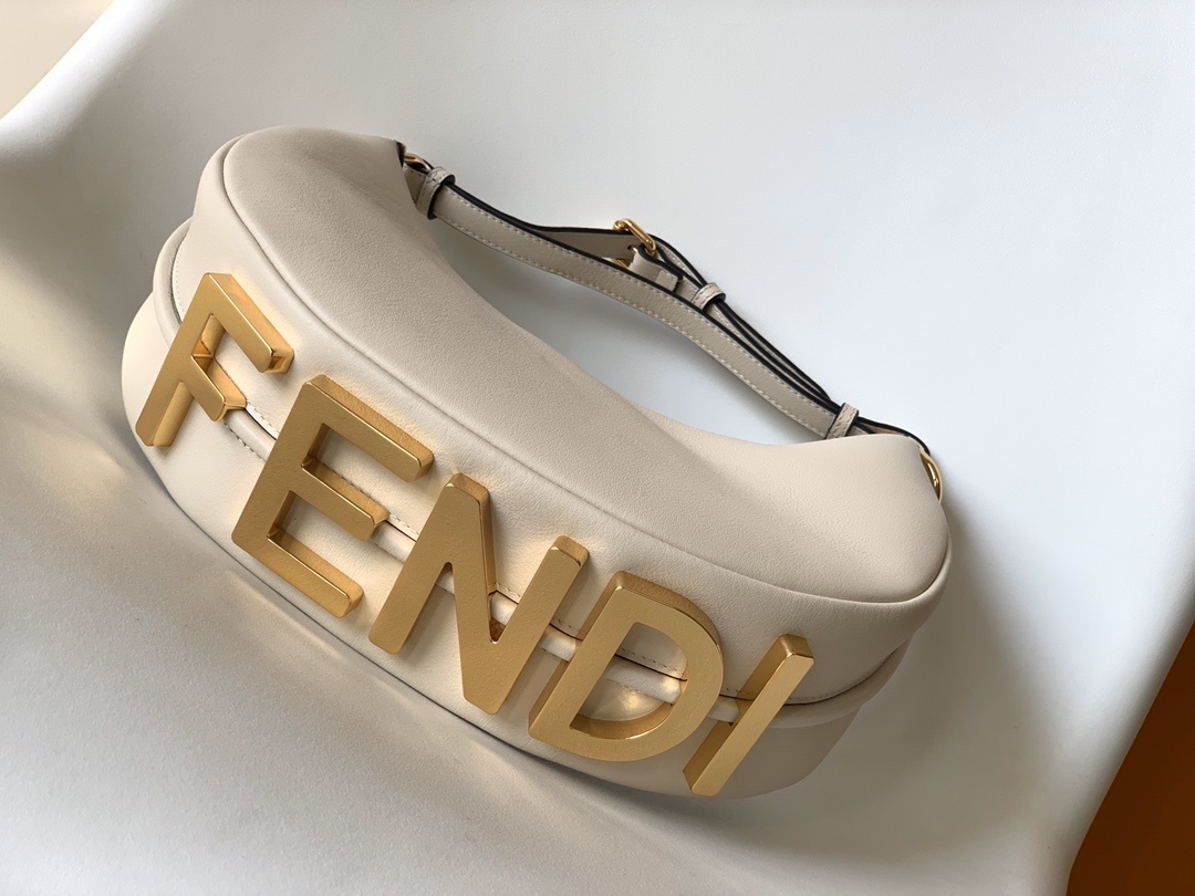 Fendi Fendigraphy leather shoulder bag often referred to as a hobo bag, featuring gold-tone metal hardware.