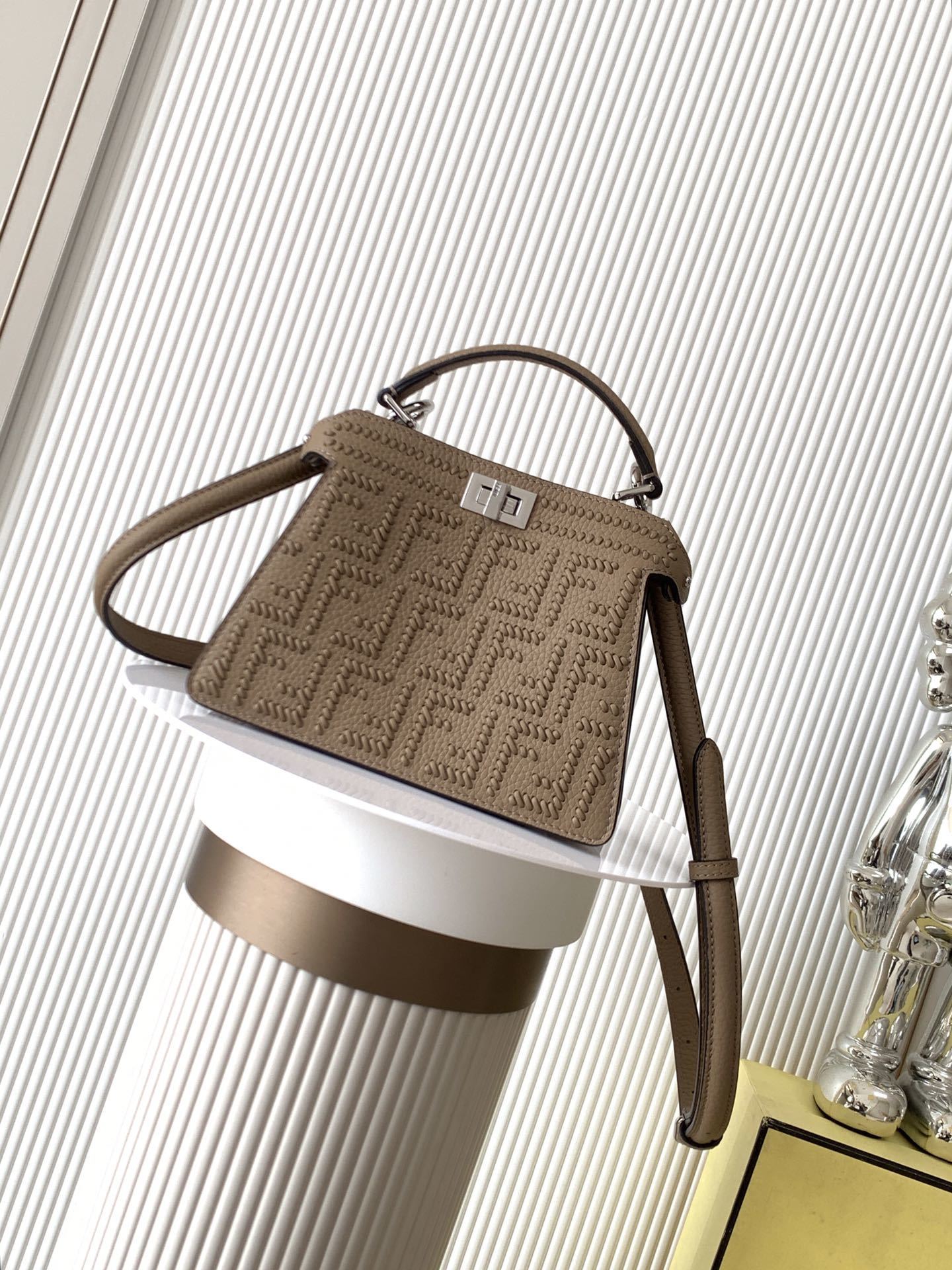 Fendi Small Peekaboo ISeeU tote bag featured in light brown with a signature turn-clasp fastening