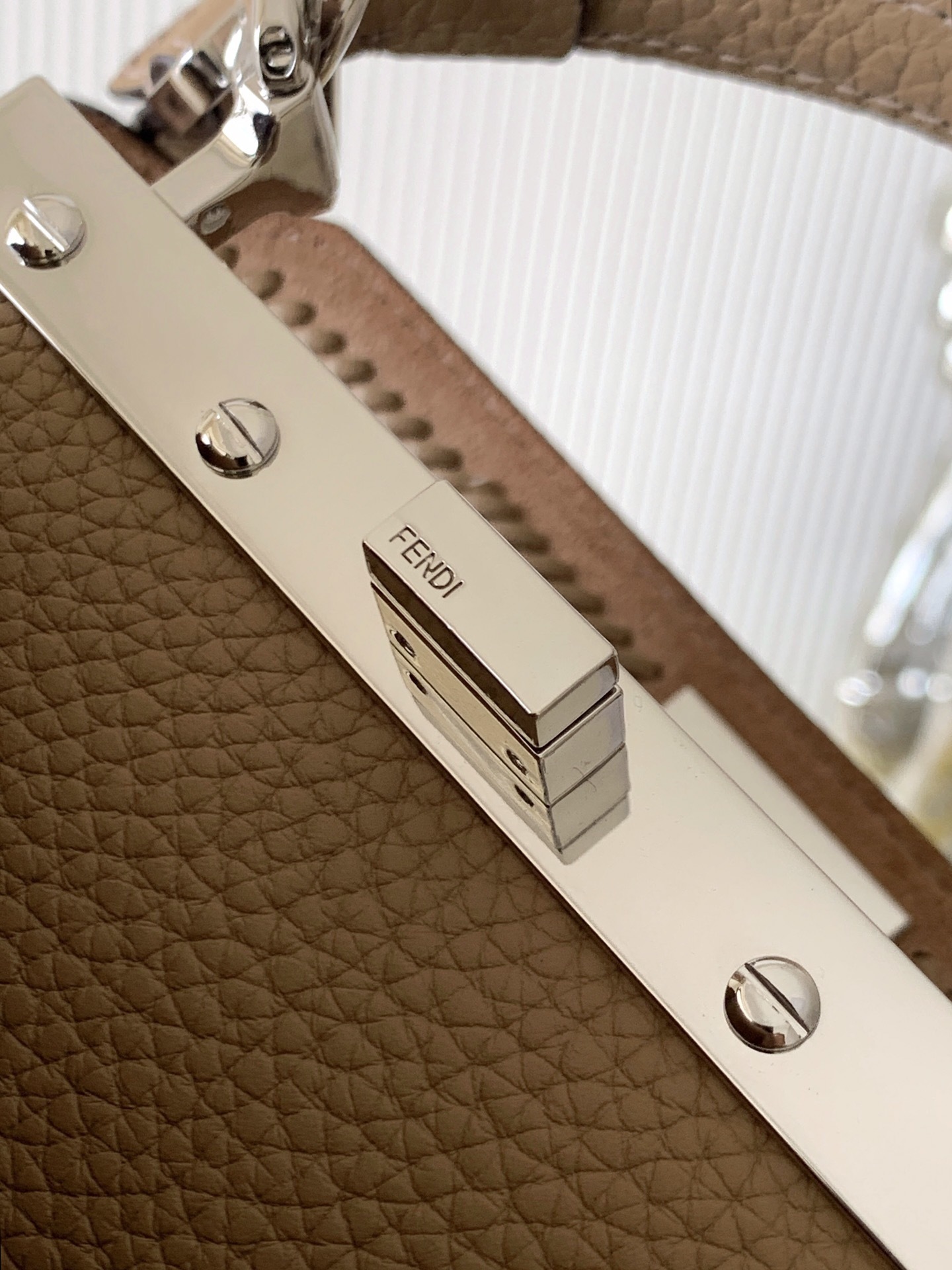 Fendi Small Peekaboo ISeeU tote bag featured in light brown with a signature turn-clasp fastening