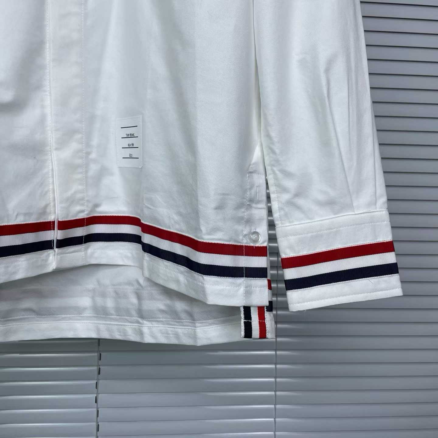 Thom Browne white cotton poplin shirt featuring the signature RWB stripe trim on the cuffs and hem
